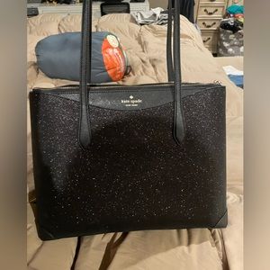 Black glitter Kate spade bag.